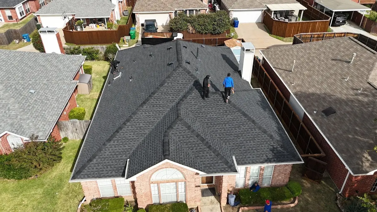 Slate & Tile Roof Repair work in progress on a Detroit property